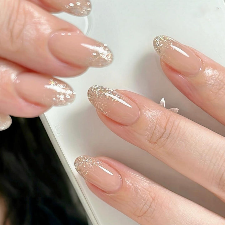 Glittering nail extensions with elegant gradient Stornfield