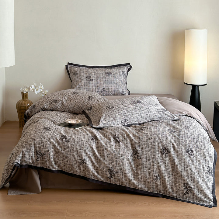 Duvet cover set with fine check pattern and subtle floral relief made of cotton blend