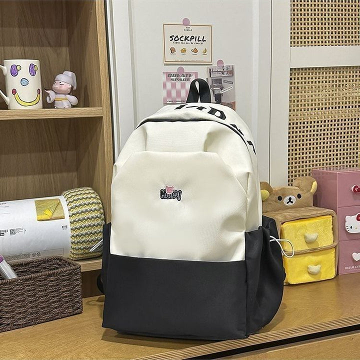 Playful backpack with embroidered Stornfield motif