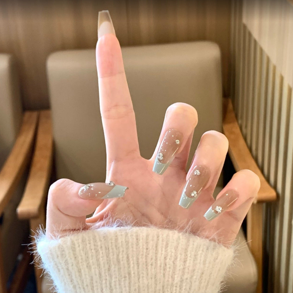 Artistic Long Stiletto Press-On Nails with Floral and Gemstone Accents Stornfield