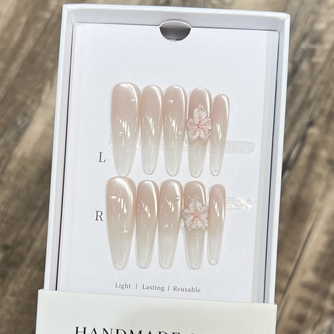 Elegant Stiletto Nail Extensions with Floral Accents Stornfield