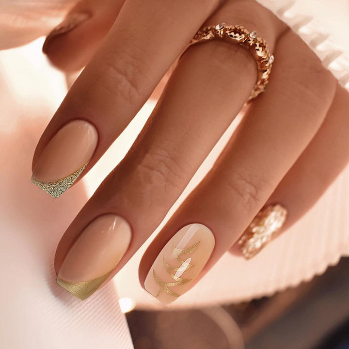 Artificial nail set with elegant gold accents Stornfield