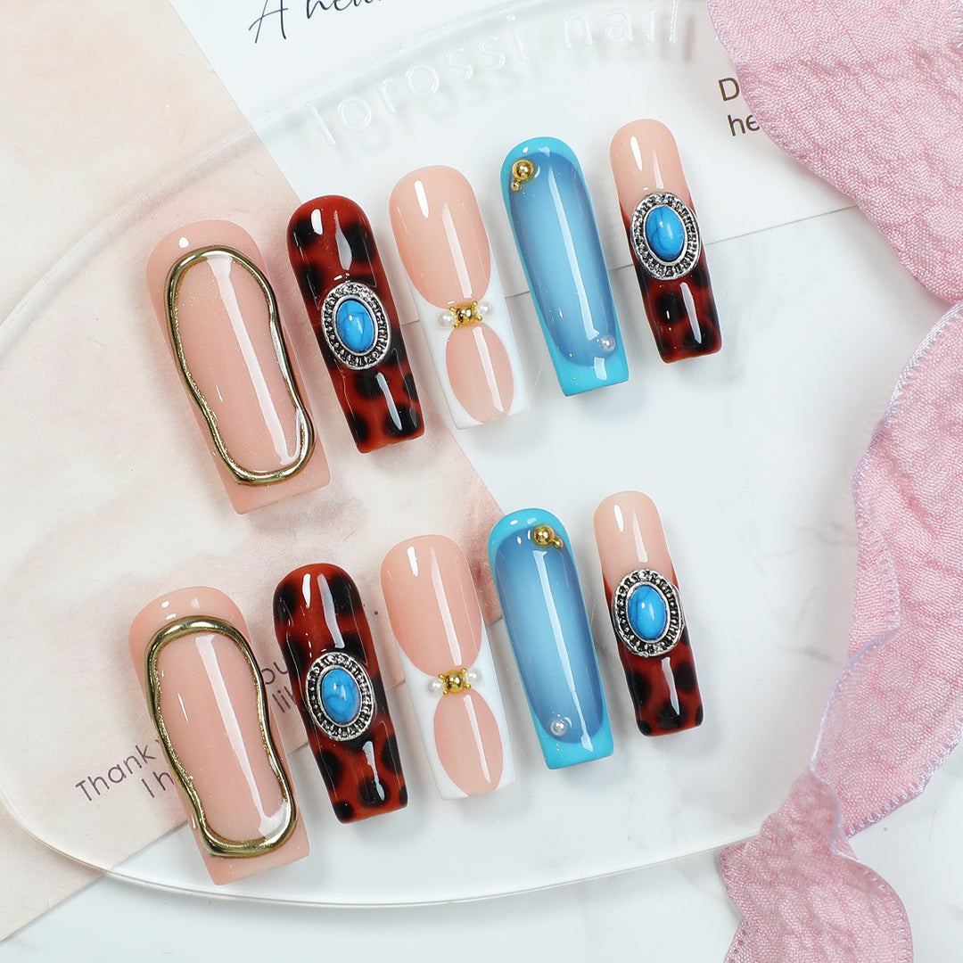 Acrylic nail set with luxurious design elements and creative accents Stornfield