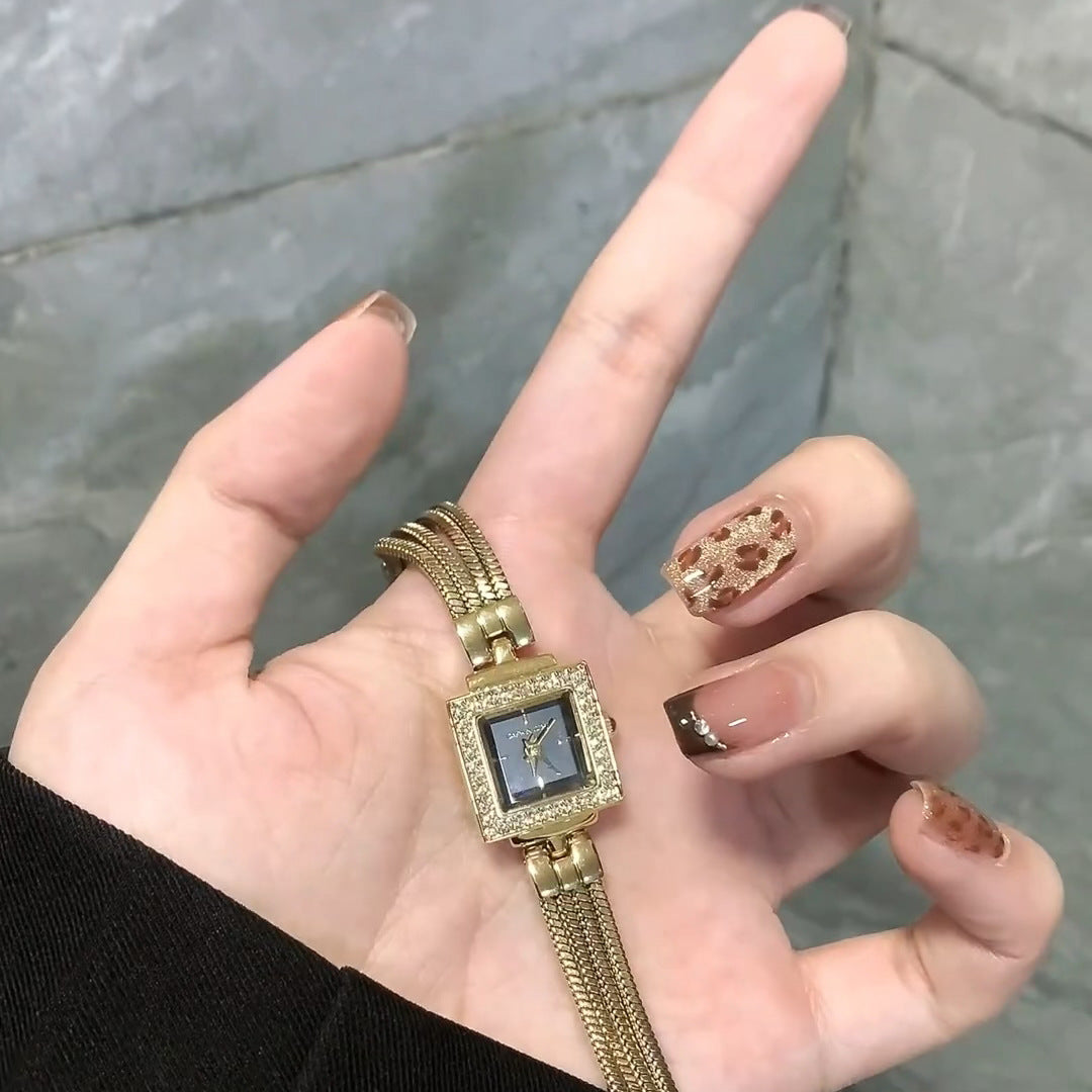 Elegant wristwatch with square dial and luxurious mesh band Stornfield