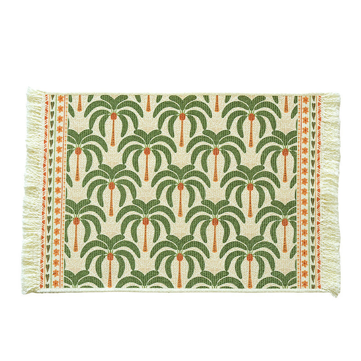 Woven living and beach rug with palm jacquard and decorative fringes Stornfield