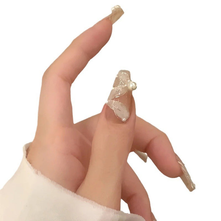 Artificial nails with pearl design and elegant decoration Stornfield