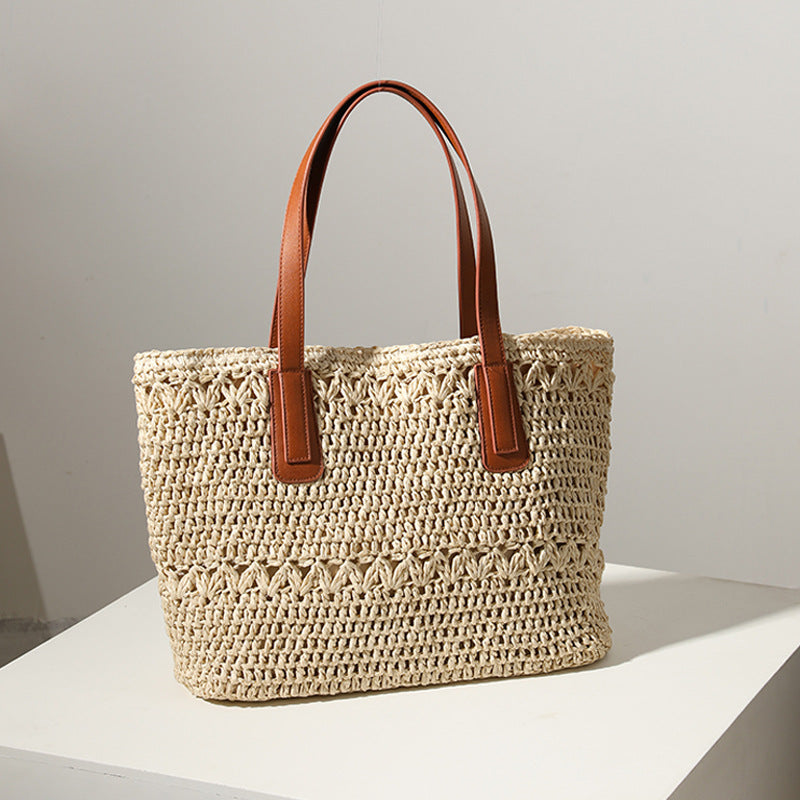 Braided straw bag with sturdy leather handles Stornfield