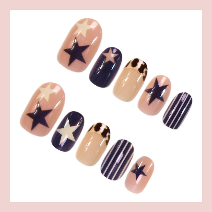 Artificial nail set with delicate rose accents Stornfield