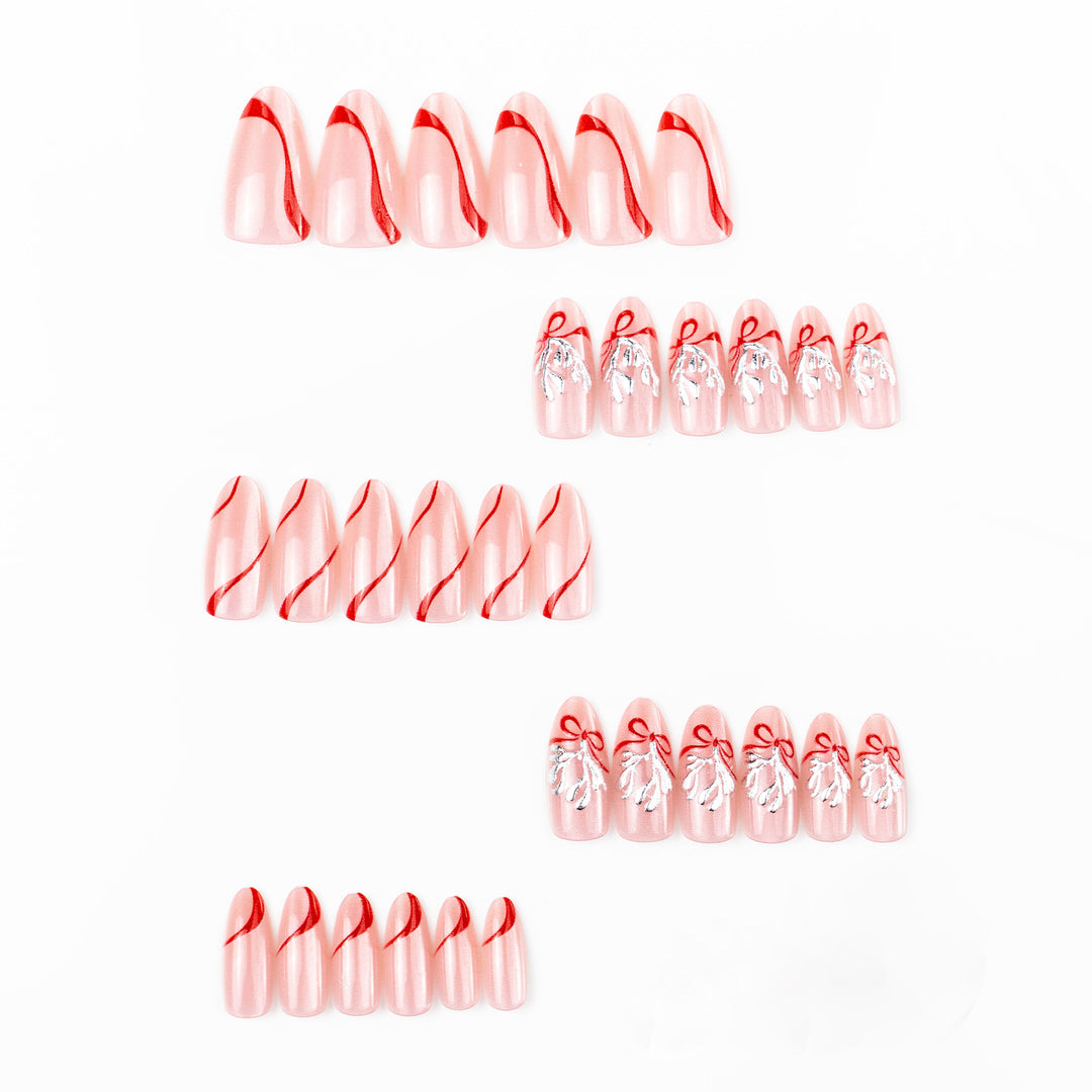 Nail art set with intricate bow and glitter decorations Stornfield