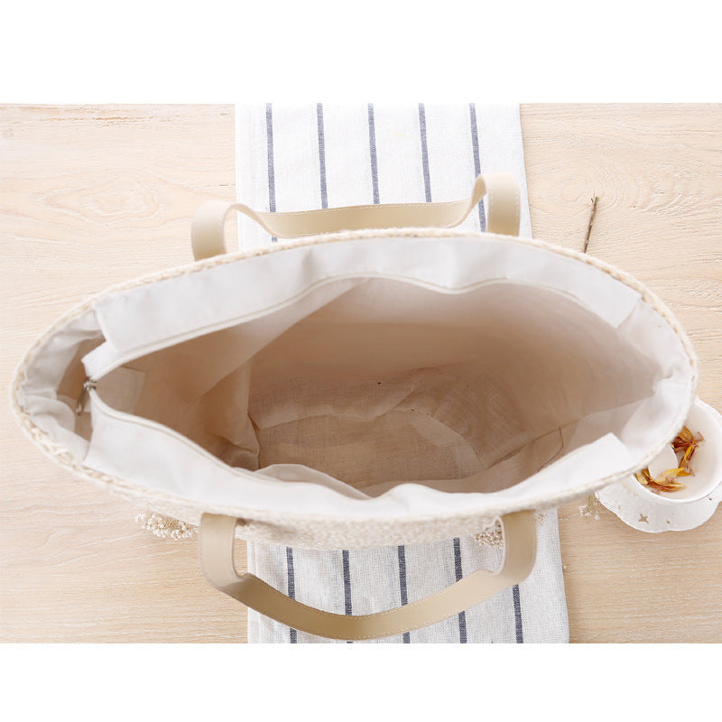 Straw bag with stylish knot closure Stornfield