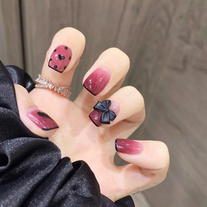 Artificial nail tips with bow design Stornfield