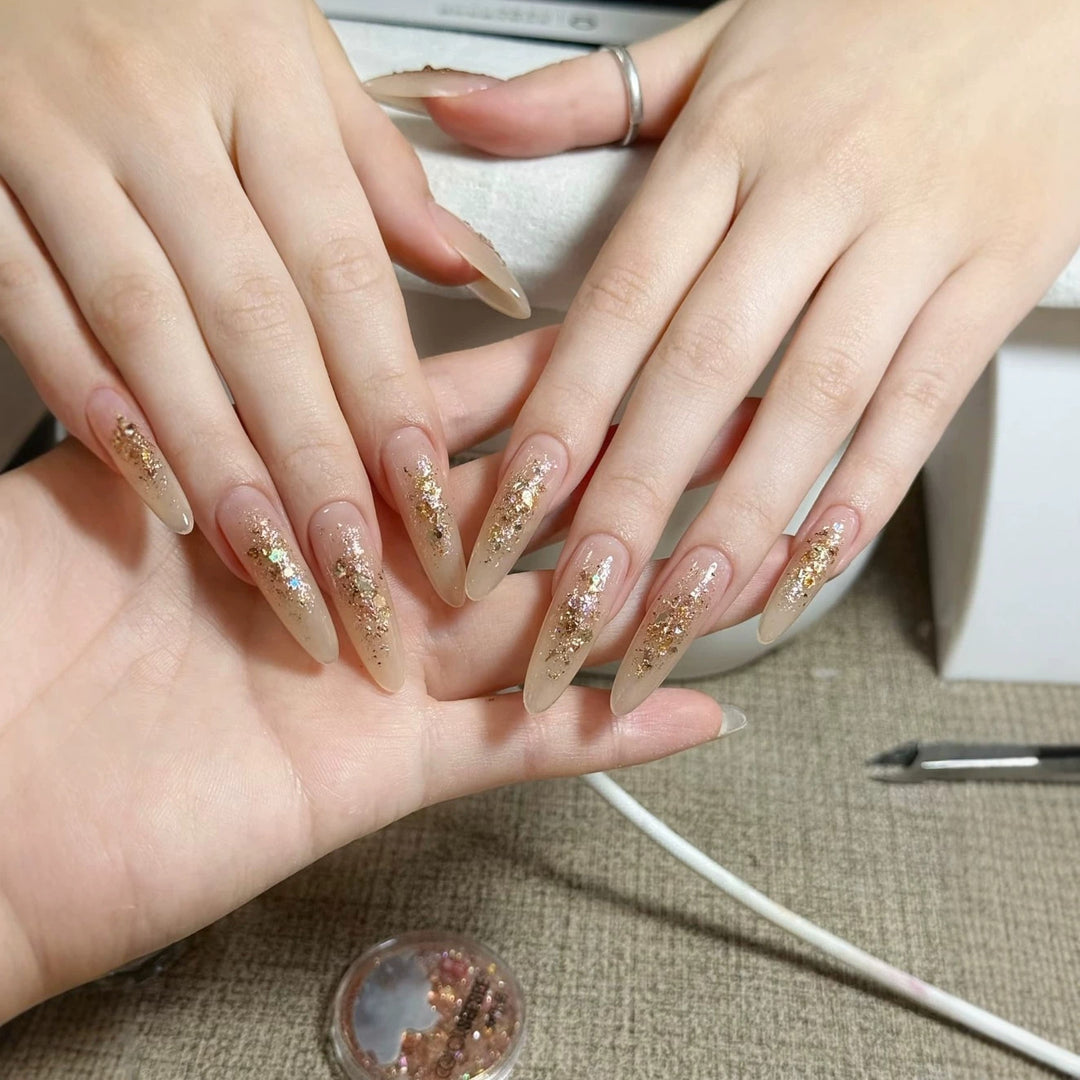 Elegant Stiletto Nail Extensions with Glitter Accents