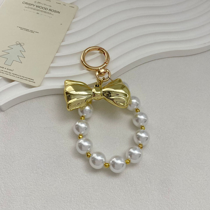 Elegant Pearl Bow Keychain Stornfield