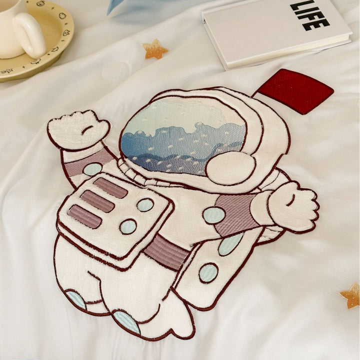 Children's bedding set with embroidered astronaut and space motif made of cotton satin Stornfield