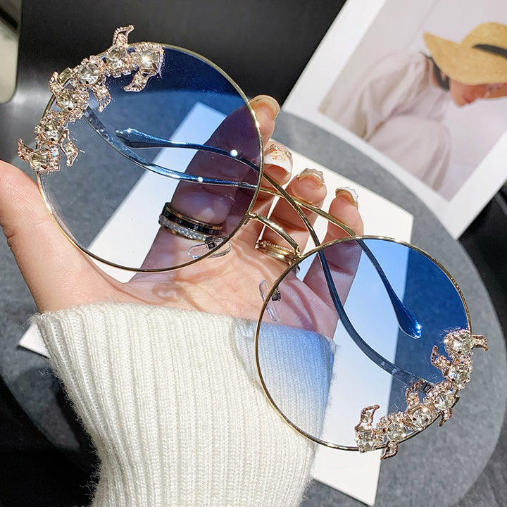 Women's fashion sunglasses with extravagant design and sparkling accents Stornfield