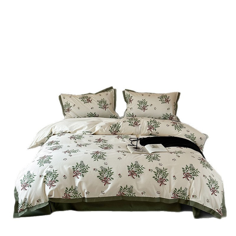 Cotton satin bedding set with floral wreaths, hotel closure and contrasting hem