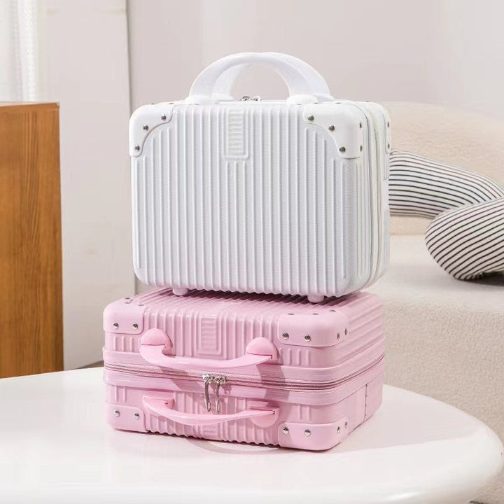 structured hard-shell travel cosmetic carry case with reinforced corner guards and ergonomic handle Stornfield