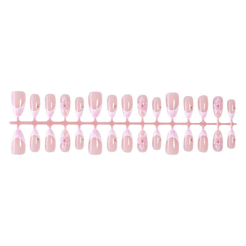 Artificial nail set with romantic flowers and elegant design accents Stornfield