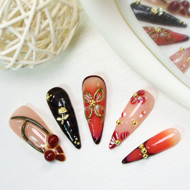 Artificial nail set with elegant floral decorations and modern accents Stornfield