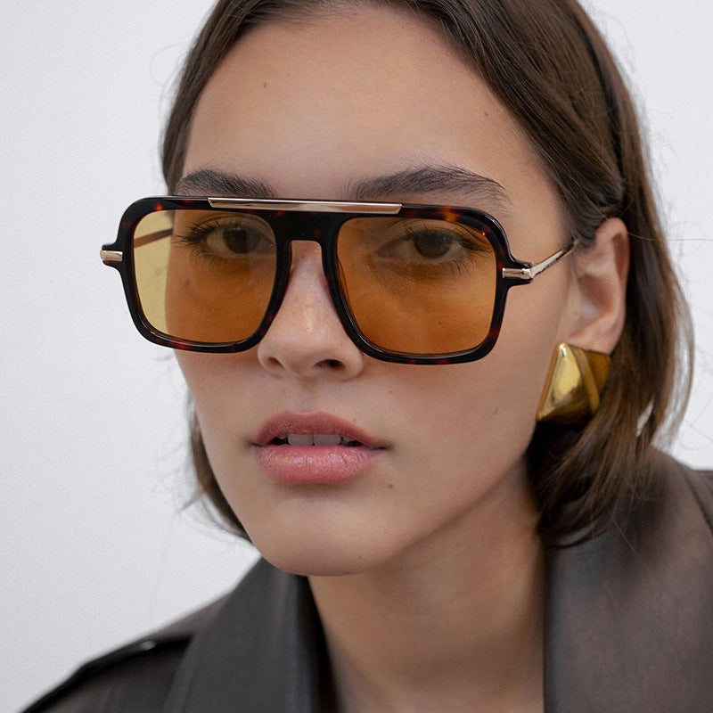Women's square designer sunglasses with gold accents and protective UV filter Stornfield