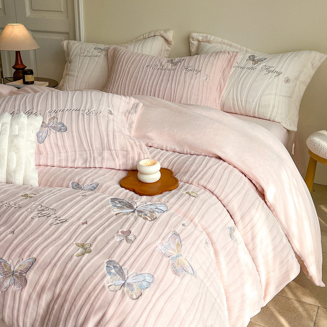 Cozy microfiber bedding with embroidered butterfly designs