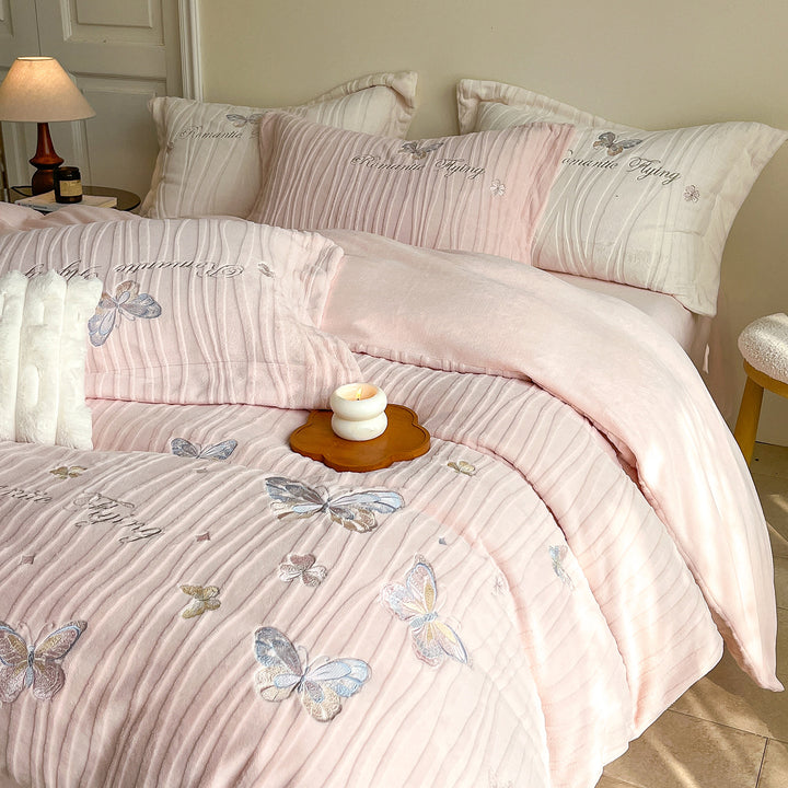 Cozy microfiber bedding with embroidered butterfly designs