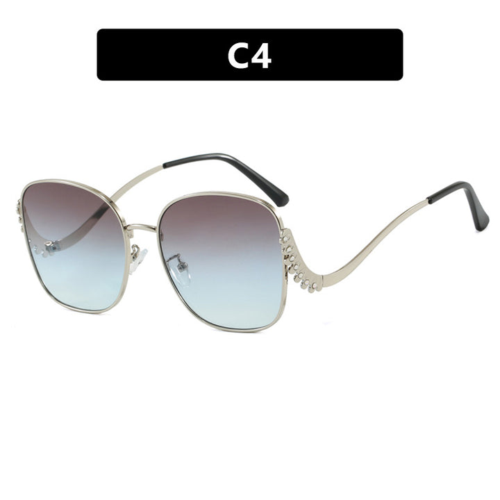 Women's striking sunglasses with sparkling appliqués Stornfield