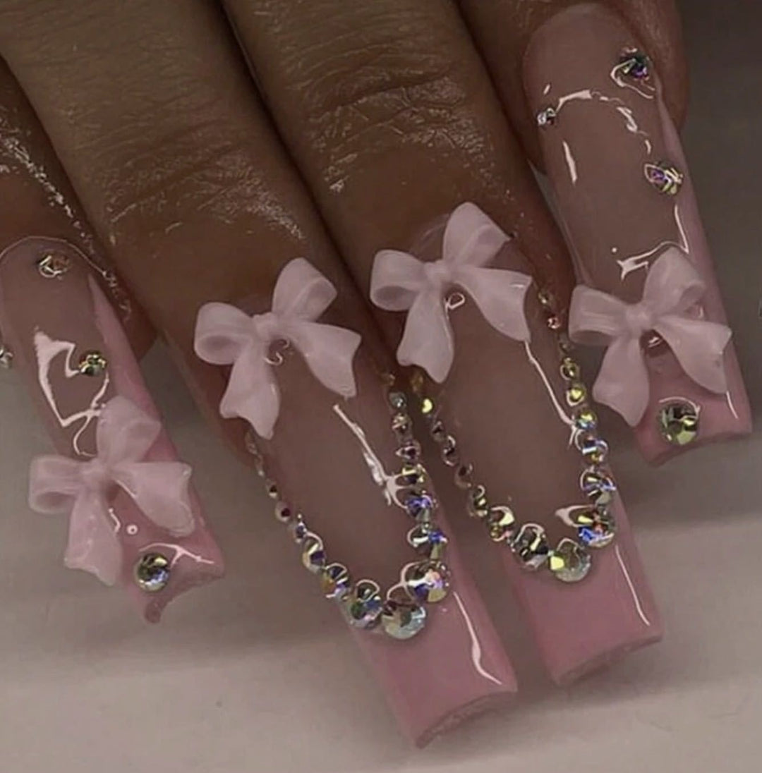 Nail art set with delicate arch decorations and rhinestone details Stornfield