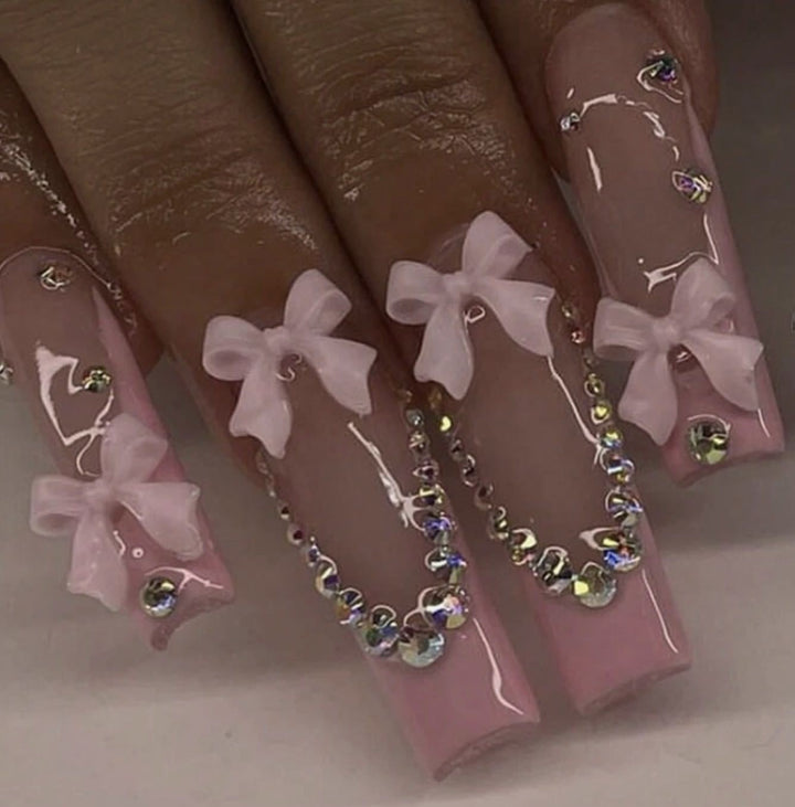 Nail art set with delicate arch decorations and rhinestone details Stornfield