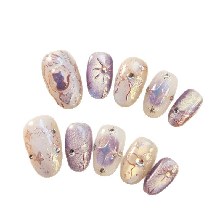 Artificial nails with playful bow and star design Stornfield