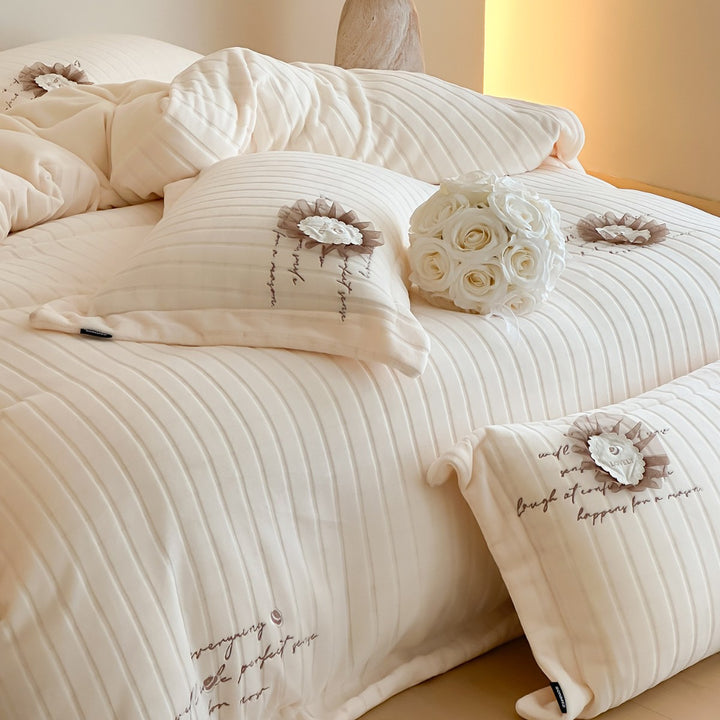 Quilted Sateen Duvet Cover Bedding Set with Appliqué Rosette & Embroidered Script