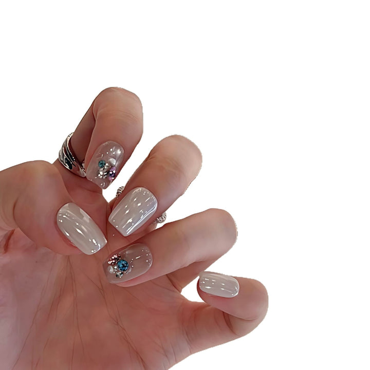 Artificial nails with elegant jewelry accents Stornfield