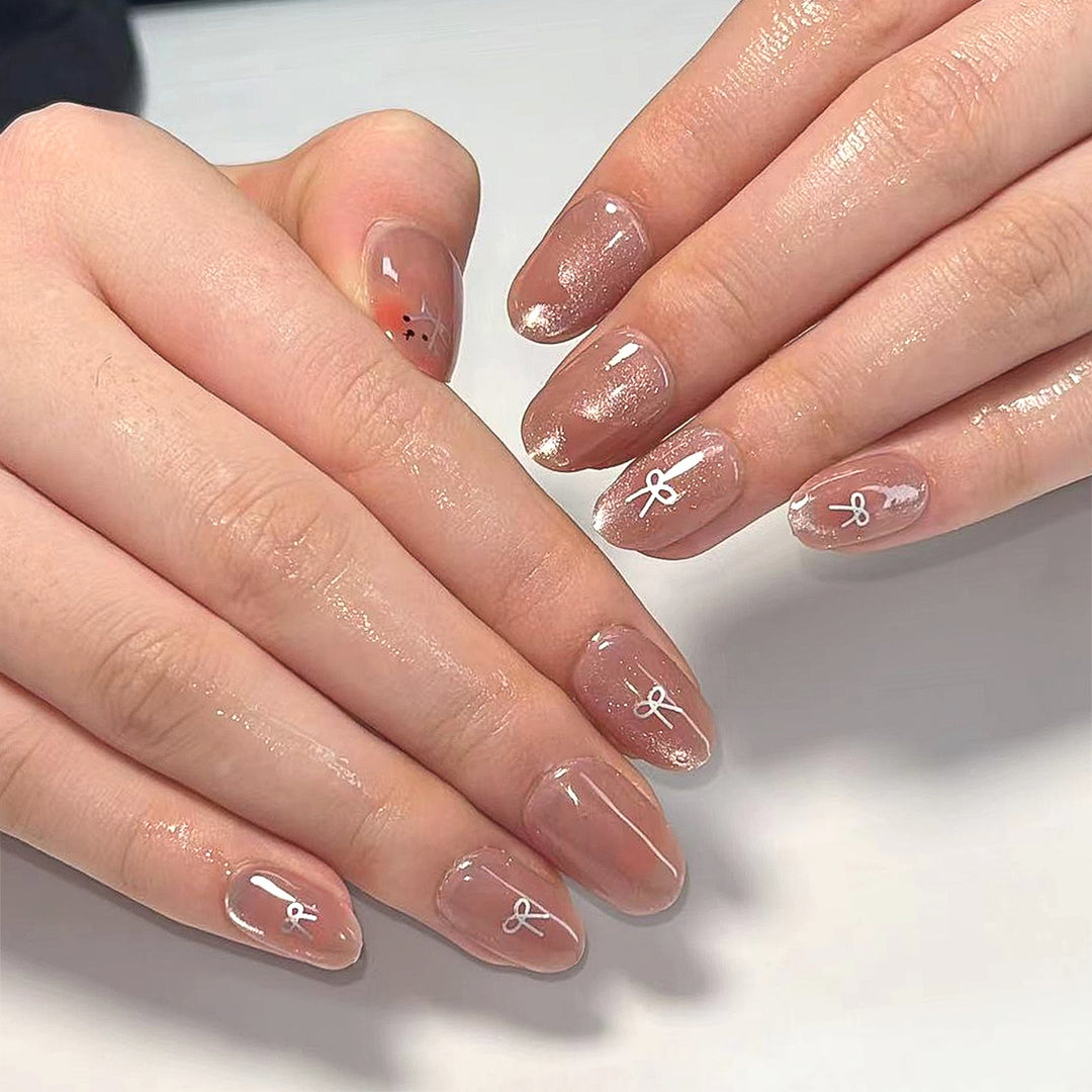 Artificial nail extensions with cute bunny design and hearts Stornfield