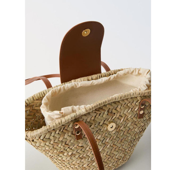 Handcrafted basket bag with leather flap Stornfield