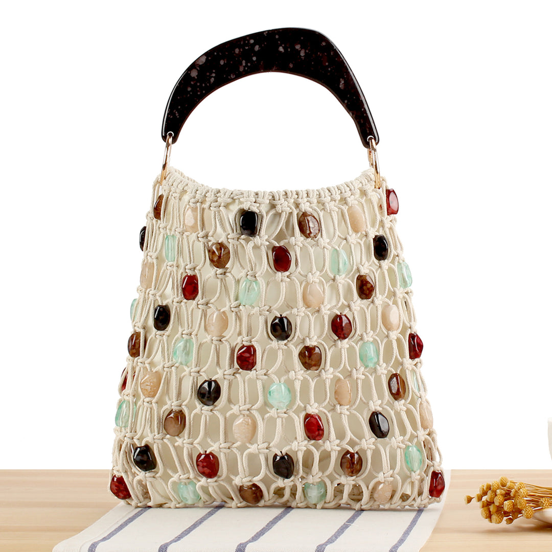 Fashionable handbag in creative net design with colorful accents Stornfield