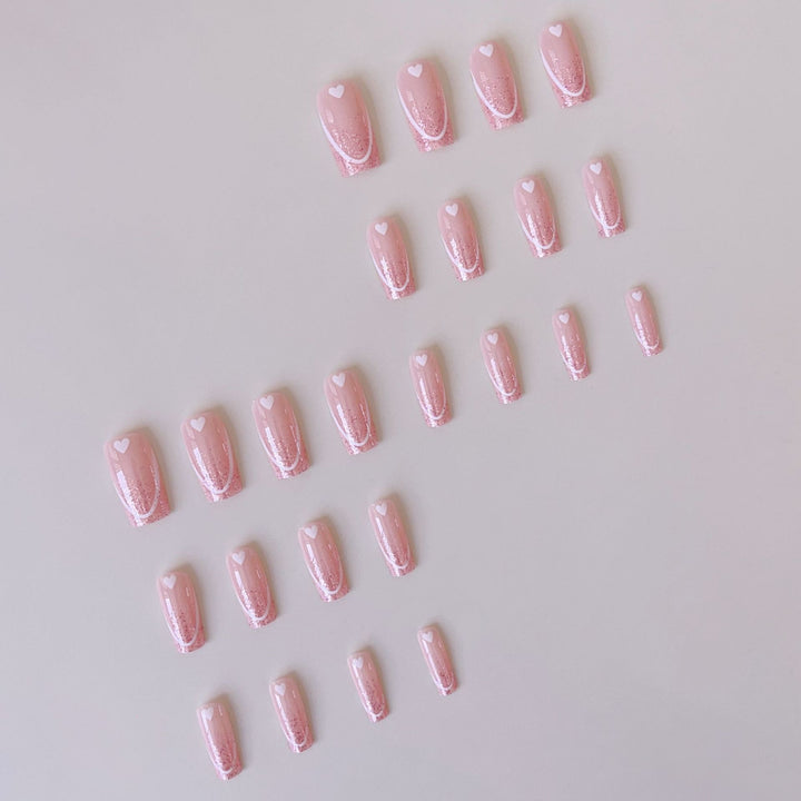 Nail art set with romantic heart designs and glamorous accents Stornfield