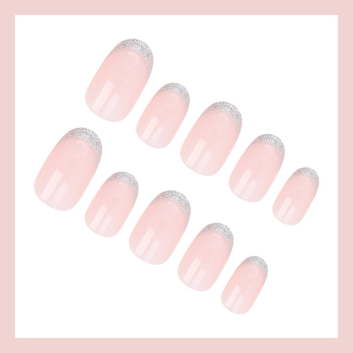 Acrylic nail set with elegant French tip and glitter accents Stornfield