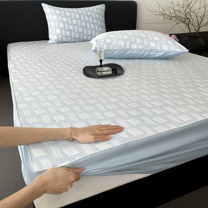 Quilted mattress protector with all-round elastic and floral relief structure
