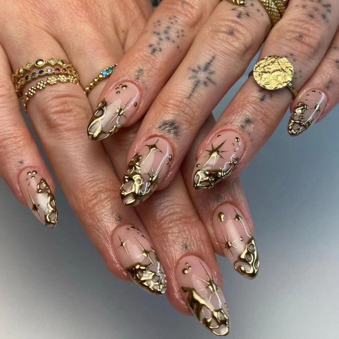 Trendy artificial nail tips with luxurious gold accents Stornfield
