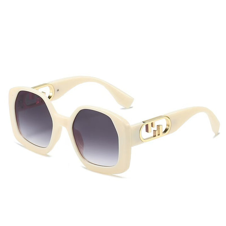Women oversized sunglasses with extravagant geometric frame and elegant accents Stornfield
