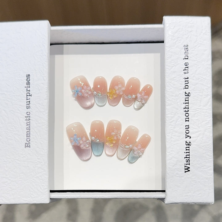 Romantic artificial nails with floral accents Stornfield