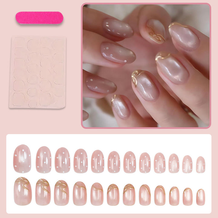 Artificial nail set with shimmering accents and elegant gold embellishments Stornfield