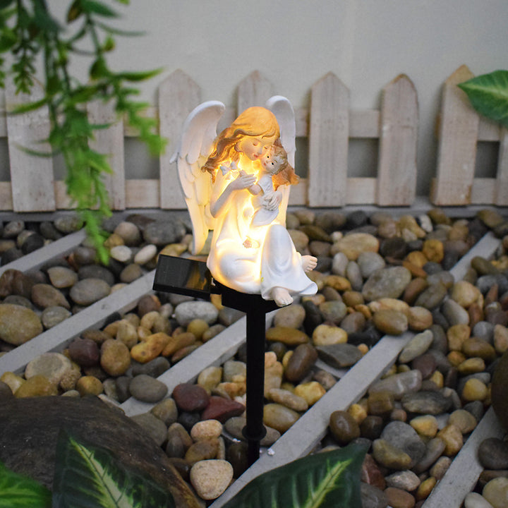 Decorative Solar Garden Stake Statue Resin Girl Figurine With Integrated Solar LED And Weatherproof Spike Stornfield