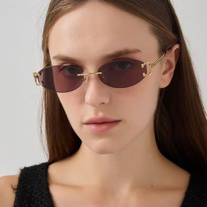 Women's elegant oval-shaped sunglasses with fashionable metal frame Stornfield