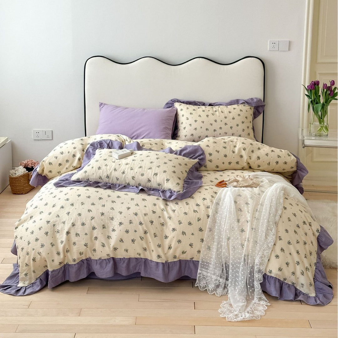 Romantic bed linen complete set made of cotton percale with delicate floral print, ruffle trim, and silky-matte finish