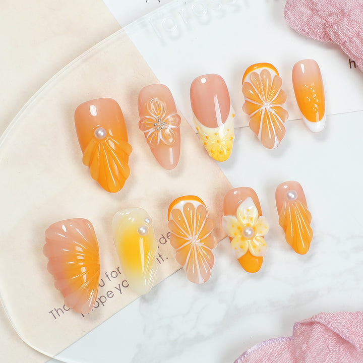 Creative nail art set with floral and glitter embellishments Stornfield