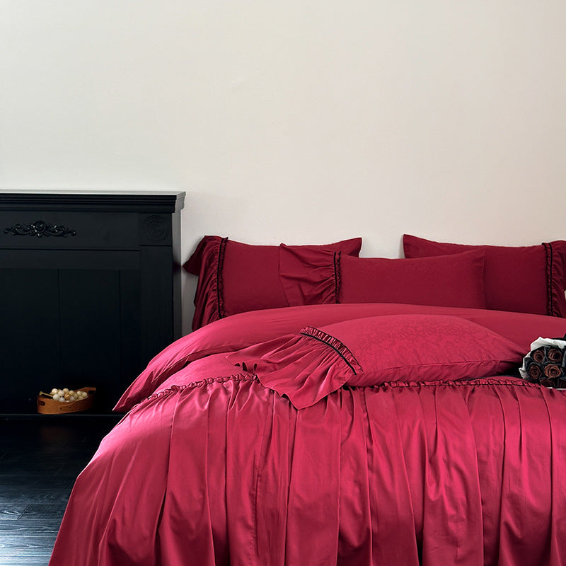 Elegant satin bedding set with pleated detail, jacquard design & ruffle