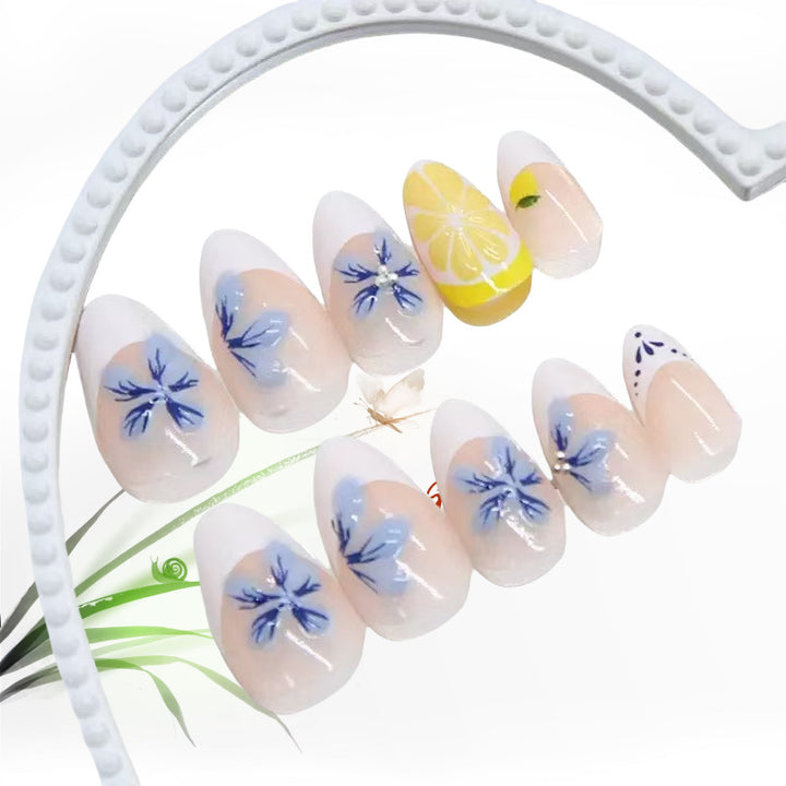 Artistic artificial nails with floral and fruity accents Stornfield