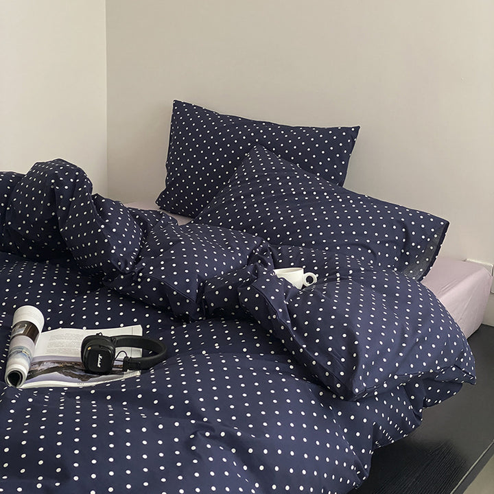 Cotton percale bedding set with minimalist polka dot pattern and hotel closure