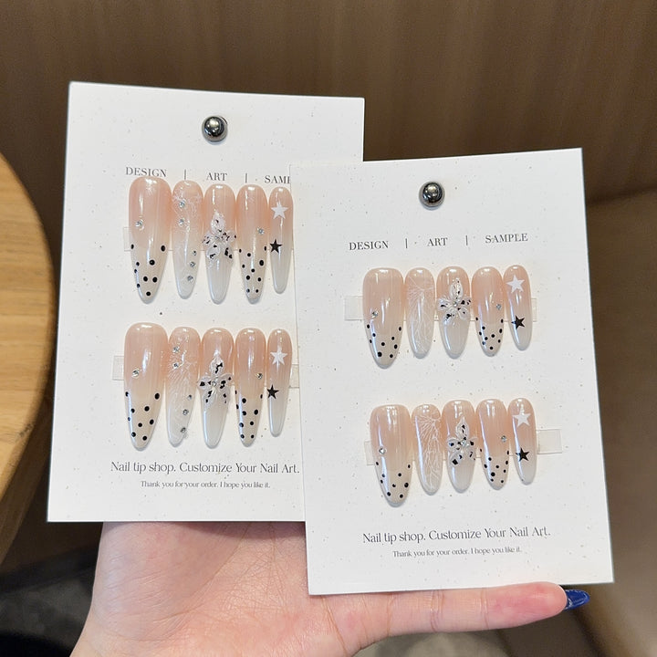 Acrylic Nails Set with Creative Designs and Shimmering Accents Stornfield